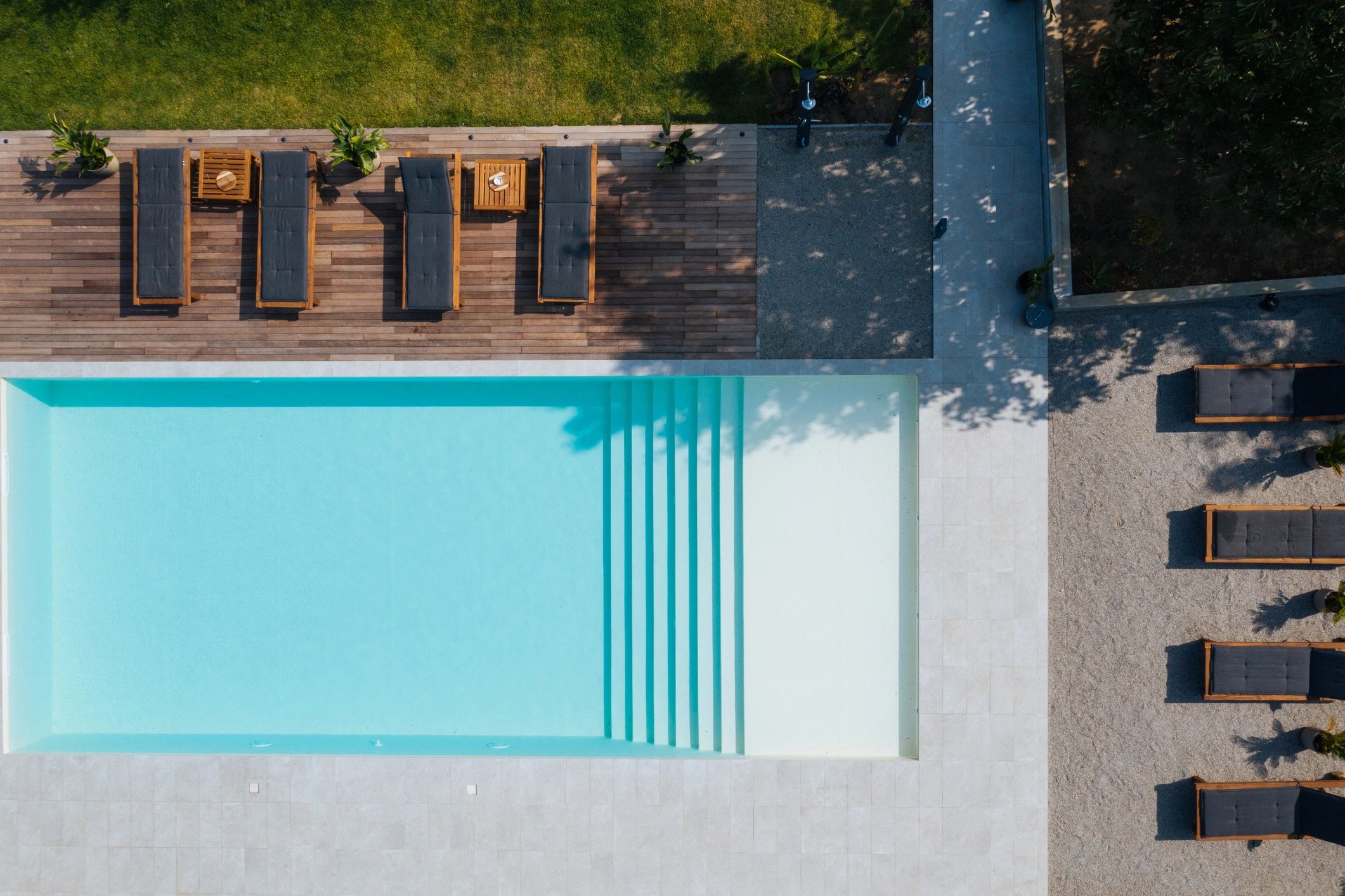 Modern swimming pool with clean decking—ideal for showcasing a safety pool cover